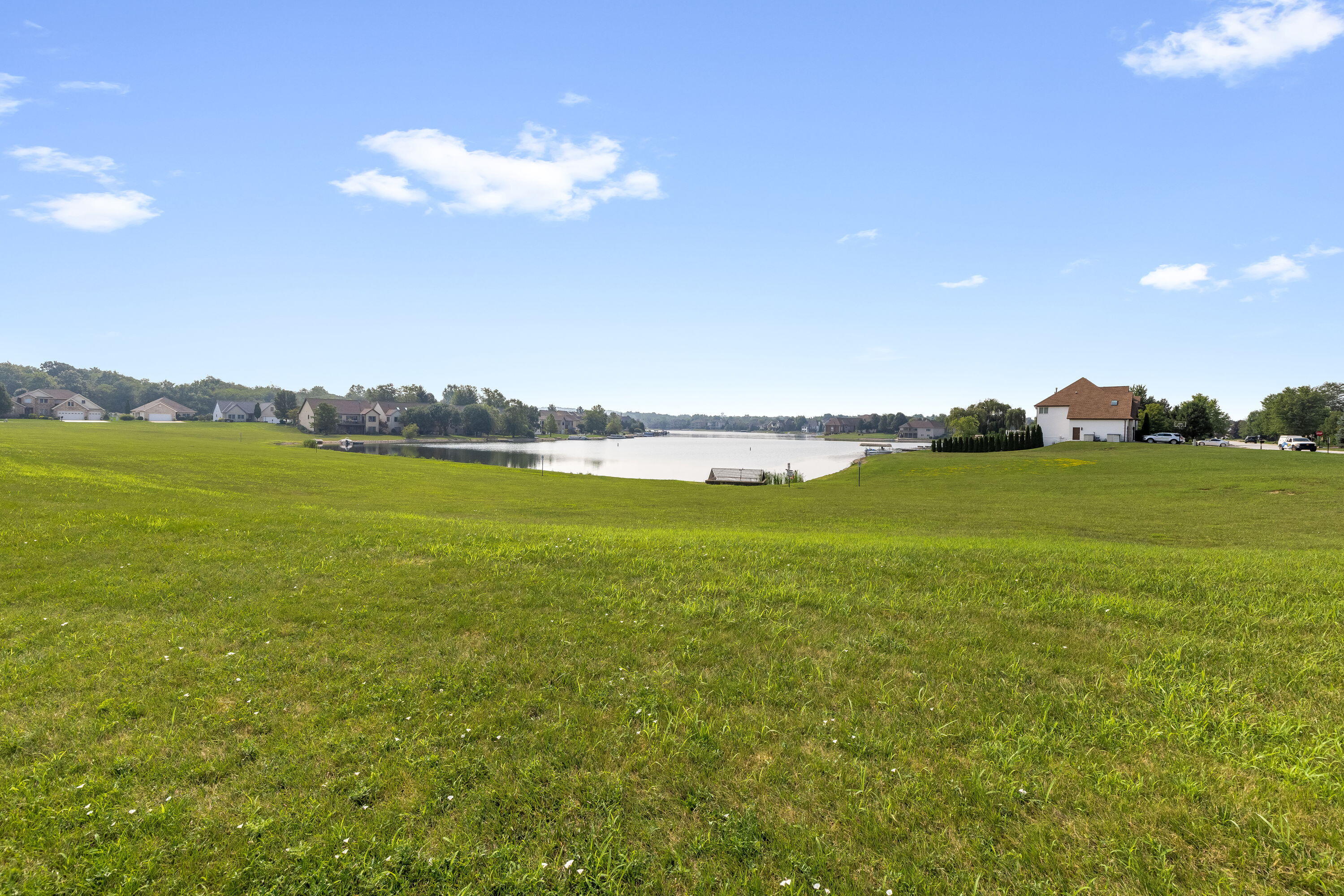 8130 Lakeview Court Winfield, IN 46307 - Photo 25 of 27 a view of an ocean with a nearby beach