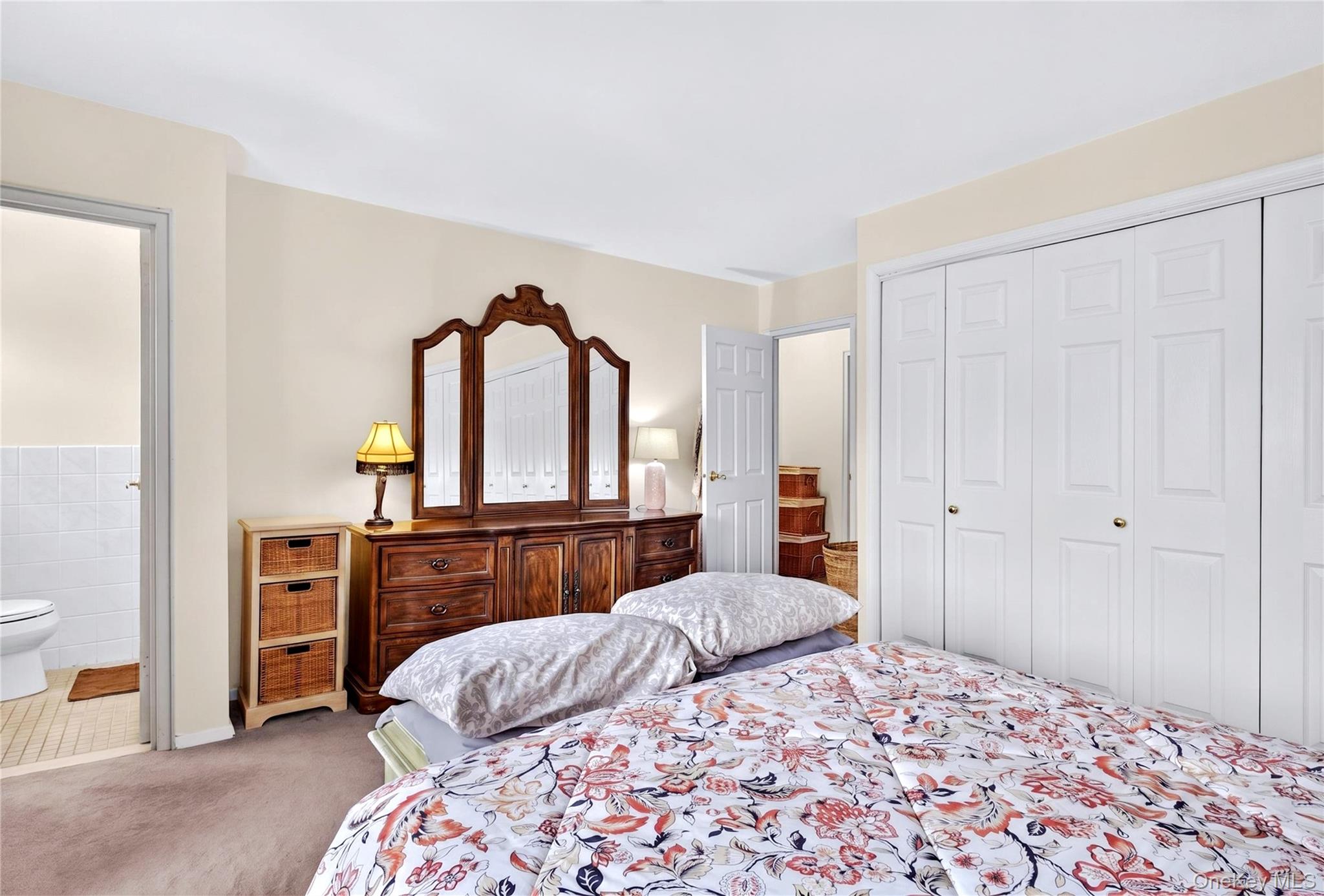 671 Pelham Road, Unit D9 New Rochelle, NY 10805 - Photo 8 of 14 View of primary bedroom with entrance to primary bath.