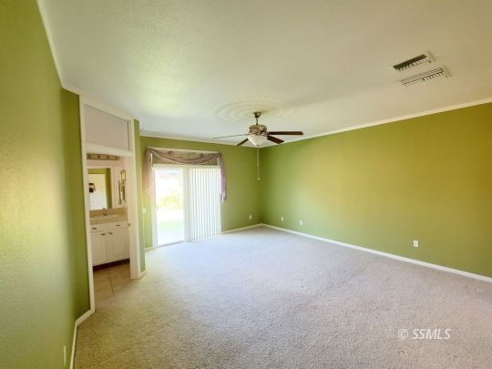 636 Pinon Court Ridgecrest, CA 93555 - Photo 10 of 22 an empty room with a empty space and windows