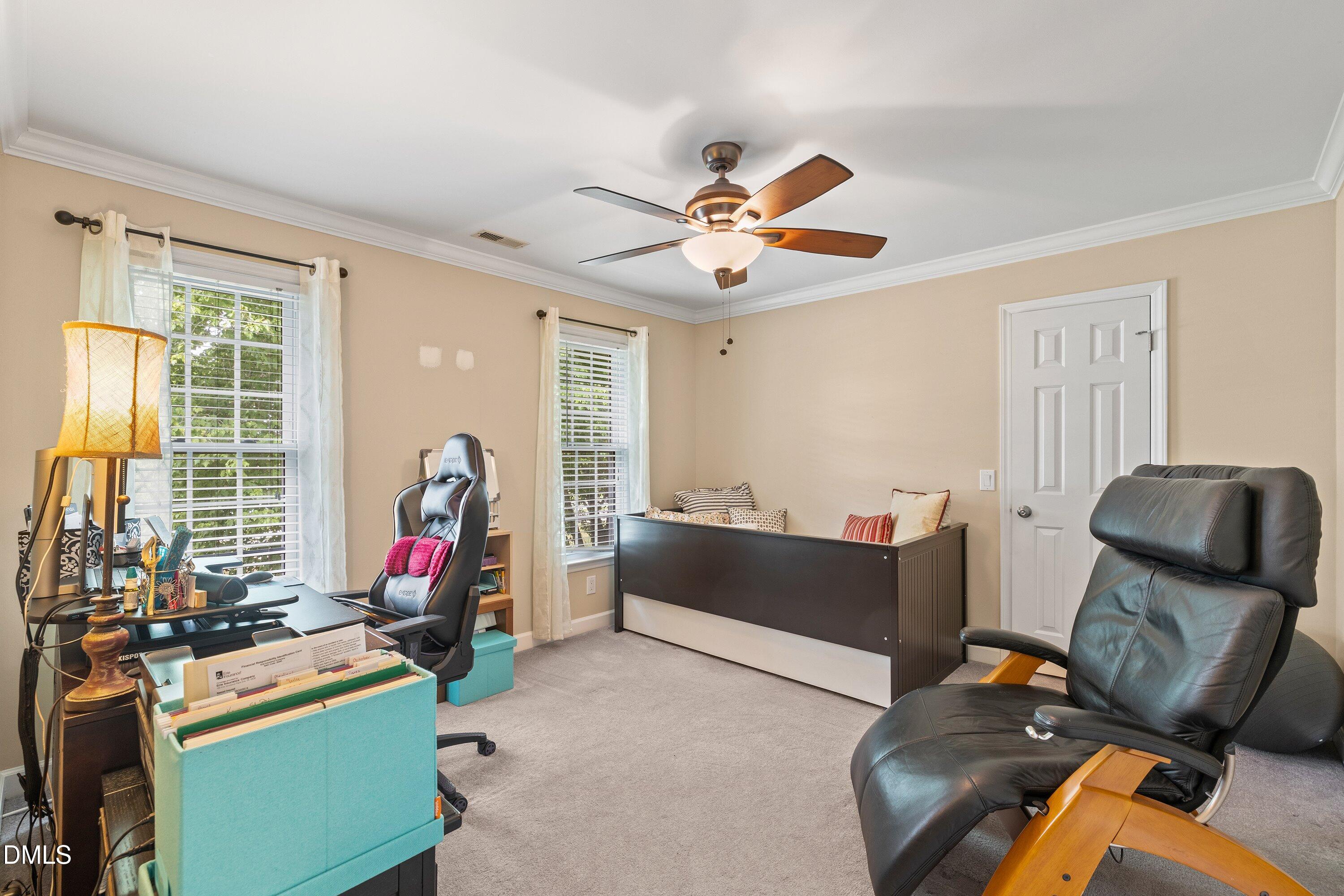 6612 Fowler Road Zebulon, NC 27597 - Photo 28 of 42 a room with furniture and a window