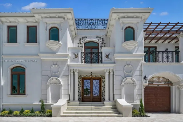 a front view of a fireplace with potted plants