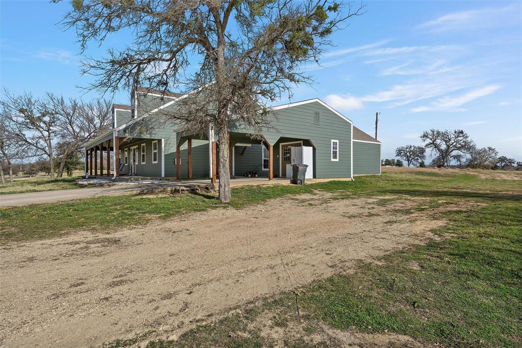 1170 Lumkins Road Forreston, TX 76041 - Photo 18 of 40 a front view of house with yard and green space
