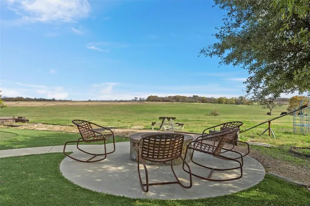a view of a swimming pool and lounge chair