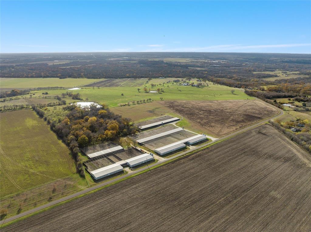 1170 Lumkins Road Forreston, TX 76041 - Photo 32 of 40 a view of a room with wooden floor