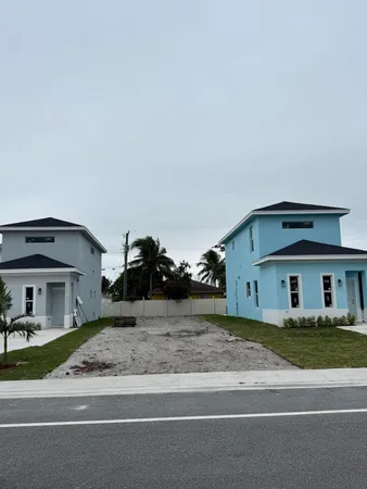 a view of street along with houses