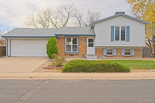 front view of a house and a yard