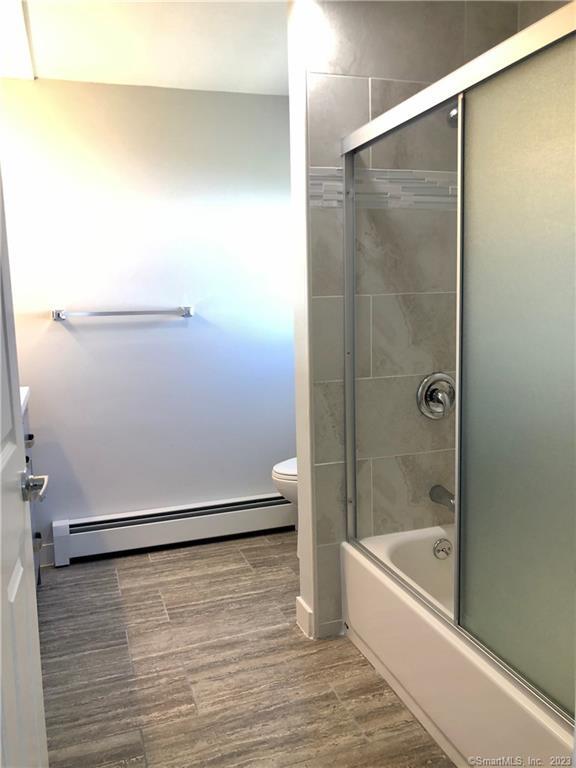 359 South Main Street, Unit 2 Middletown, CT 06457 - Photo 11 of 21 a bathroom with a bathtub and a shower