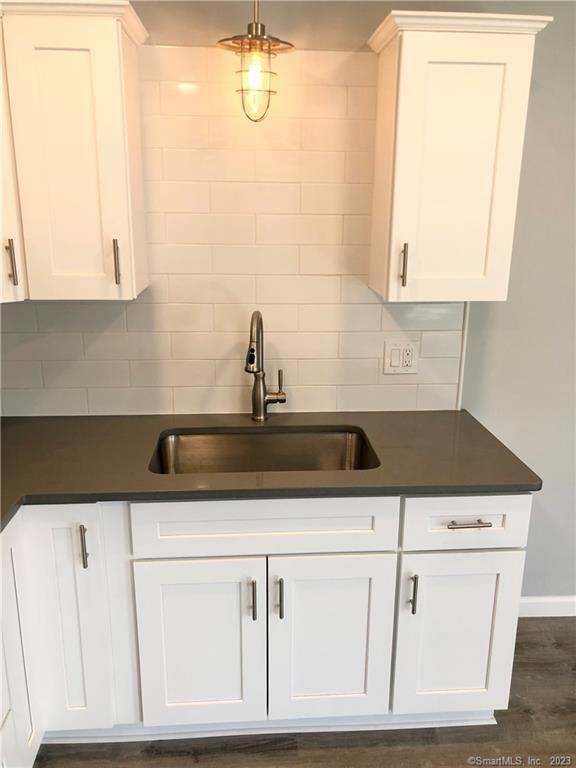 359 South Main Street, Unit 2 Middletown, CT 06457 - Photo 6 of 21 a kitchen with white cabinets and sink