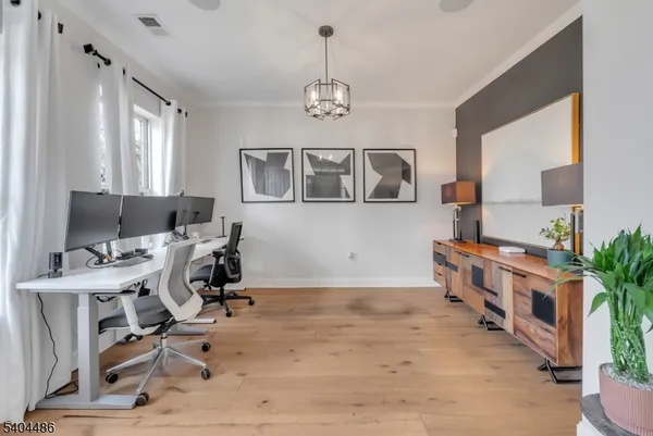 a workspace with chandelier