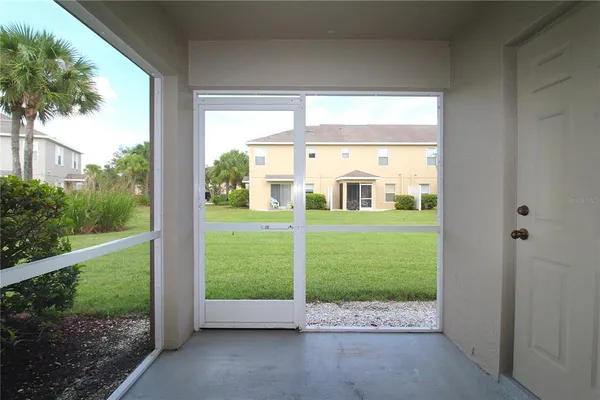 a view of a house with a back yard