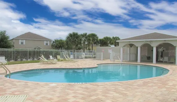 a view of a house with a swimming pool