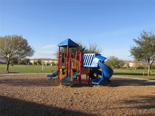 a view of a park with slide