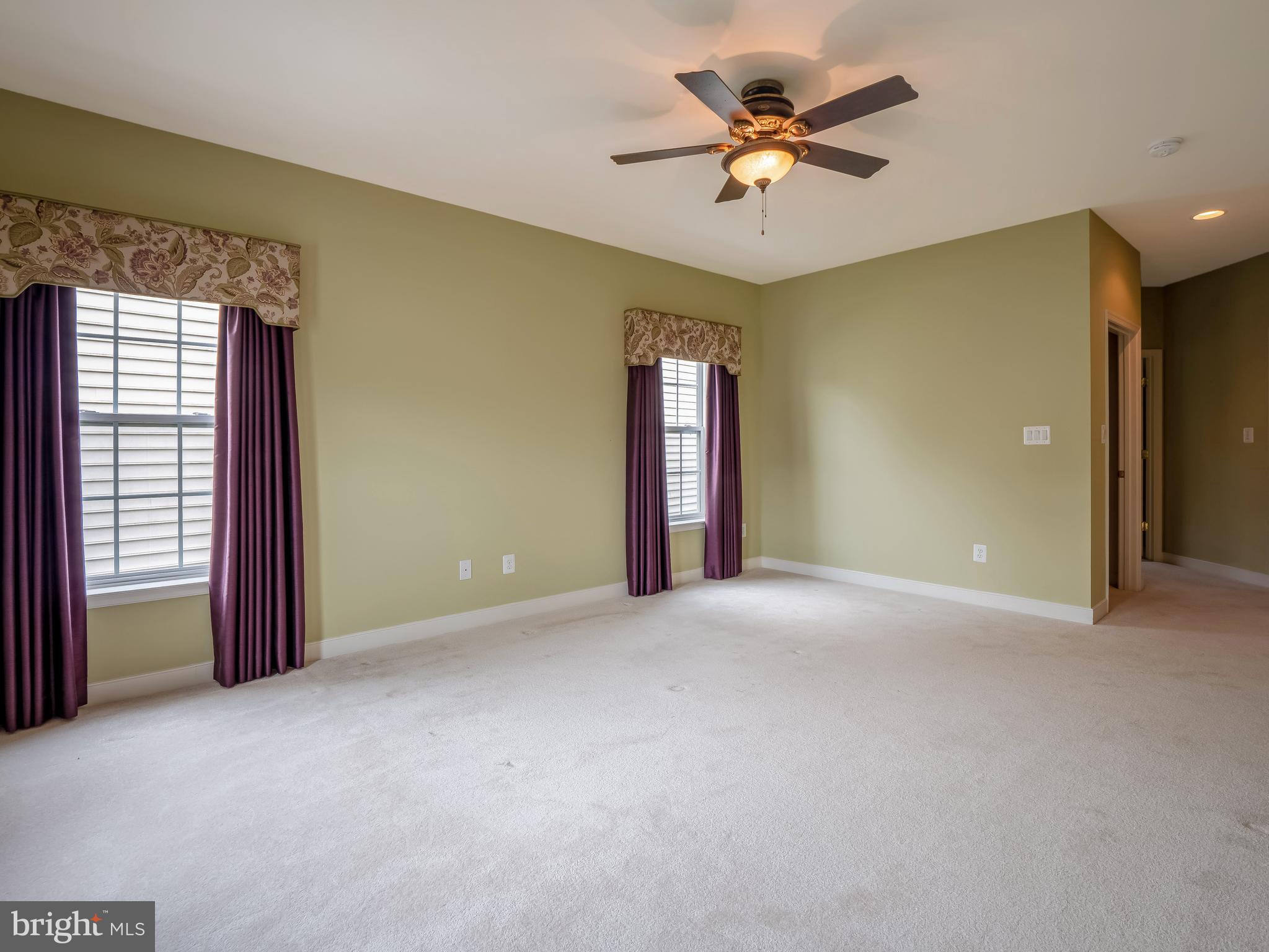 13191 Triple Crown Loop Gainesville, VA 20155 - Photo 21 of 40 main level master bedroom