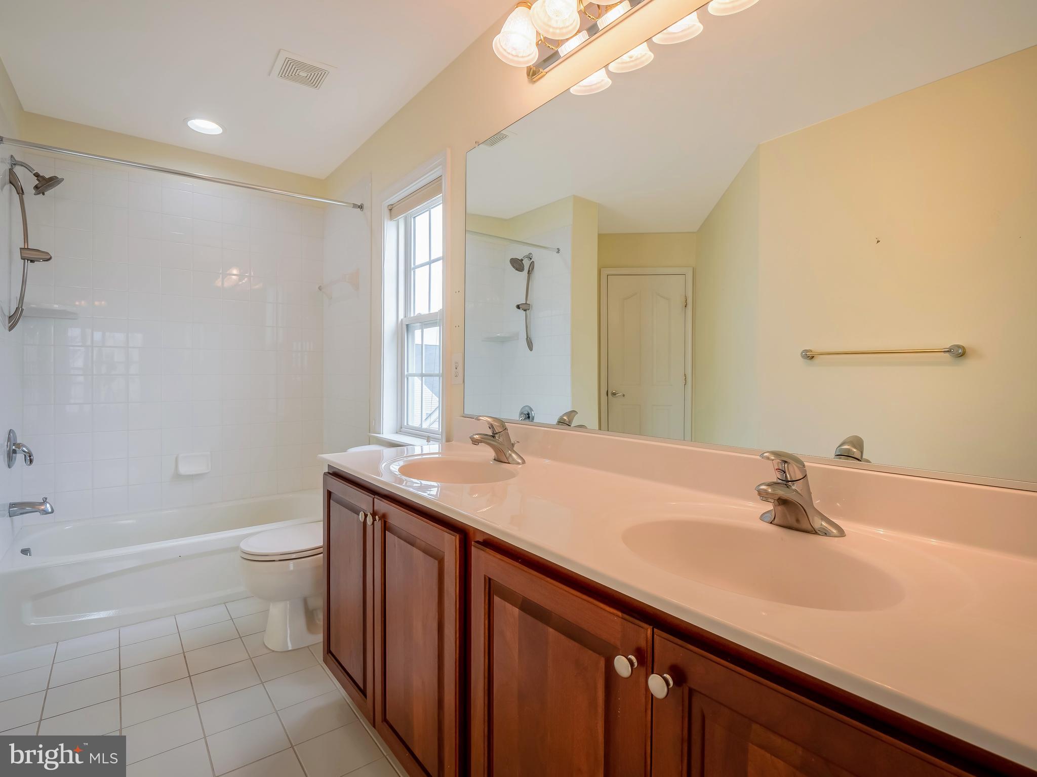 13191 Triple Crown Loop Gainesville, VA 20155 - Photo 30 of 40 jack and jill bathroom