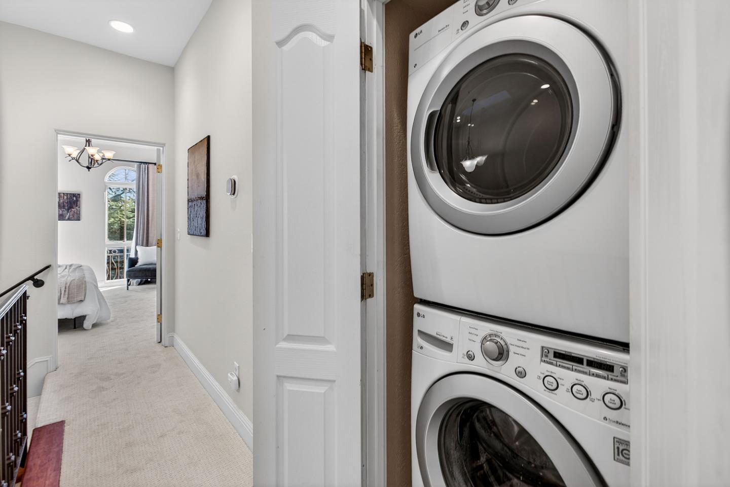 484 Gabilan Street Los Altos, CA 94022 - Photo 25 of 34 a view of a hallway with washer and dryer