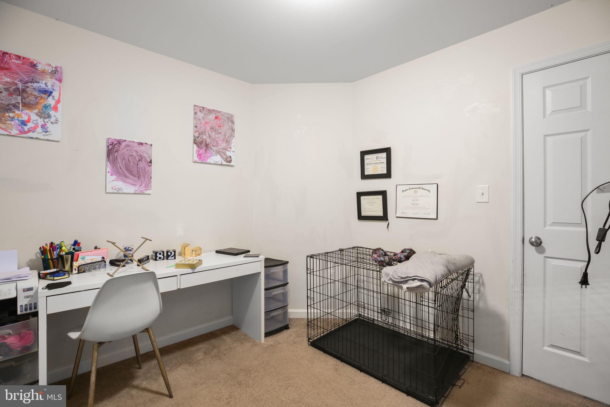 317 12th Street Colonial Beach, VA 22443 - Photo 11 of 28 a view of a workspace with furniture