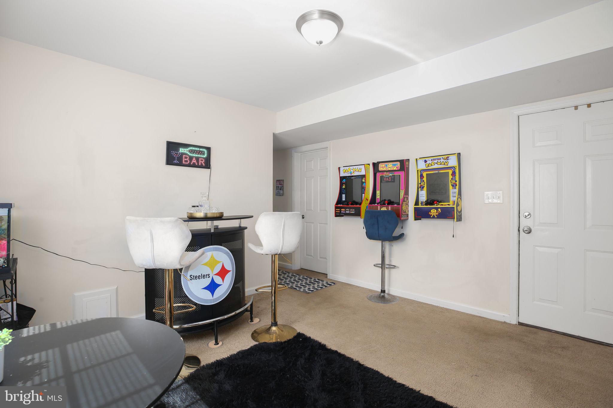 317 12th Street Colonial Beach, VA 22443 - Photo 16 of 28 a view of living room with furniture and wooden floor
