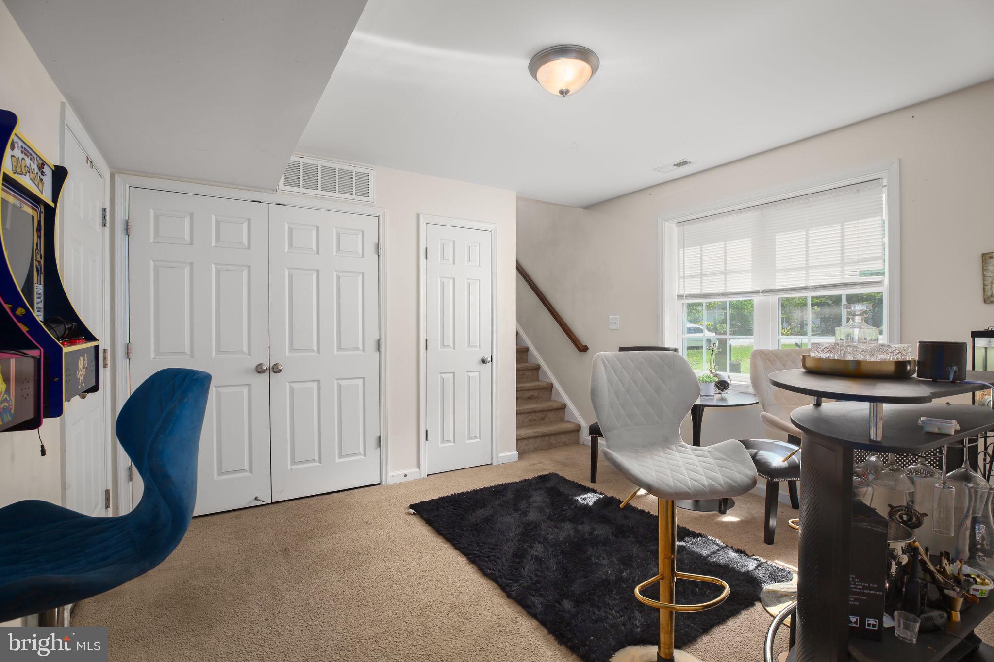 317 12th Street Colonial Beach, VA 22443 - Photo 18 of 28 a living room with furniture and a window
