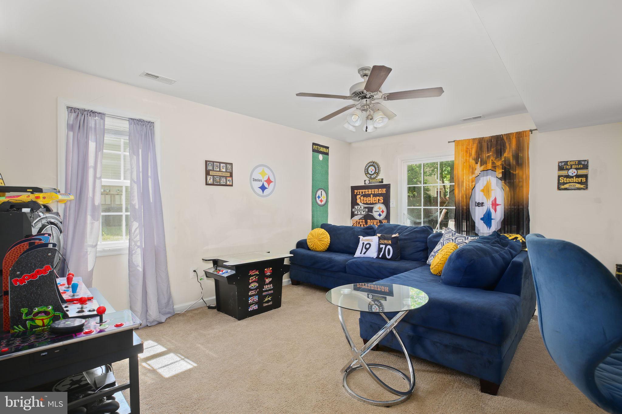 317 12th Street Colonial Beach, VA 22443 - Photo 19 of 28 a living room with furniture and a window
