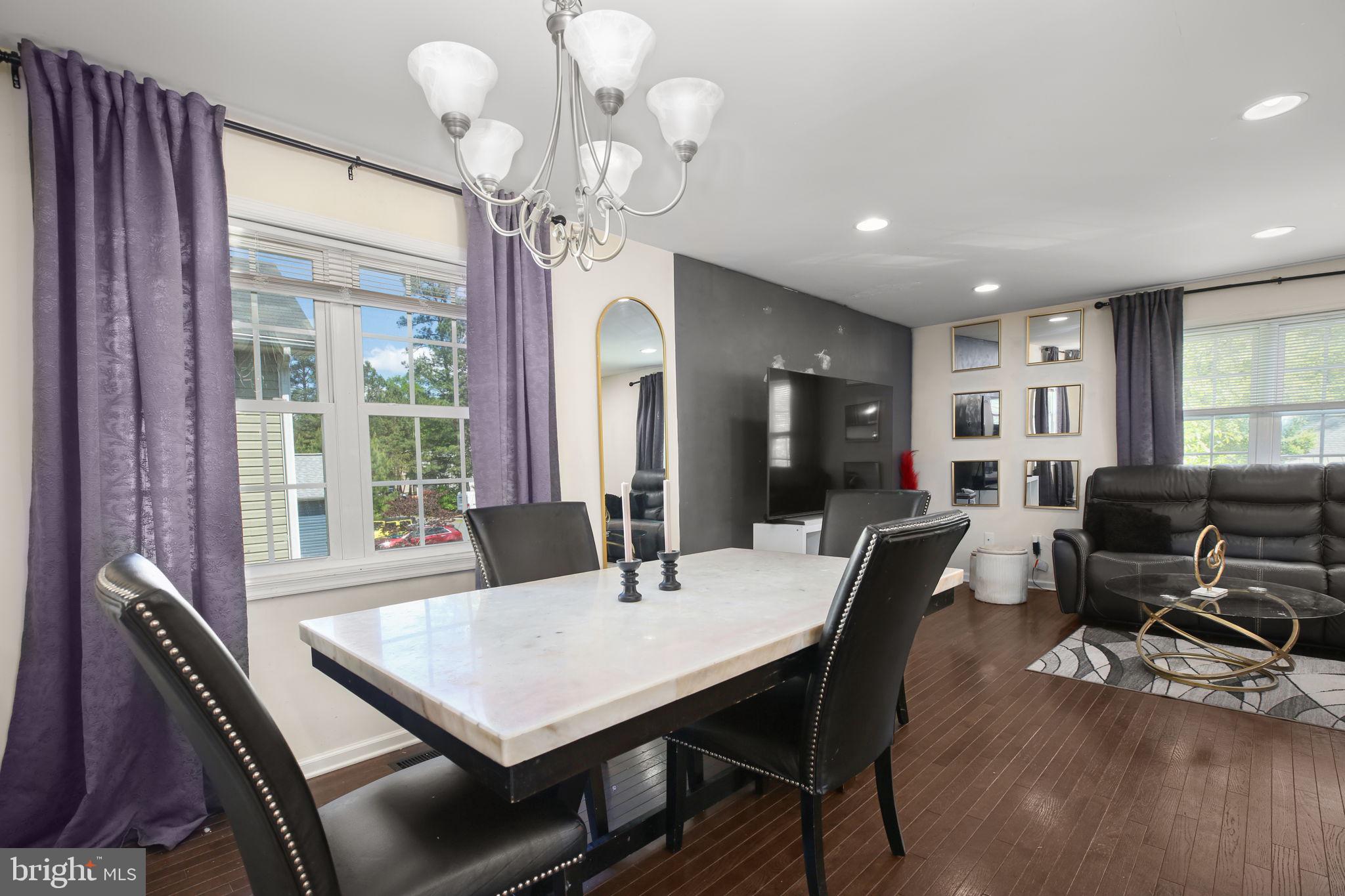 317 12th Street Colonial Beach, VA 22443 - Photo 7 of 28 a view of a dining room with furniture window and outside view