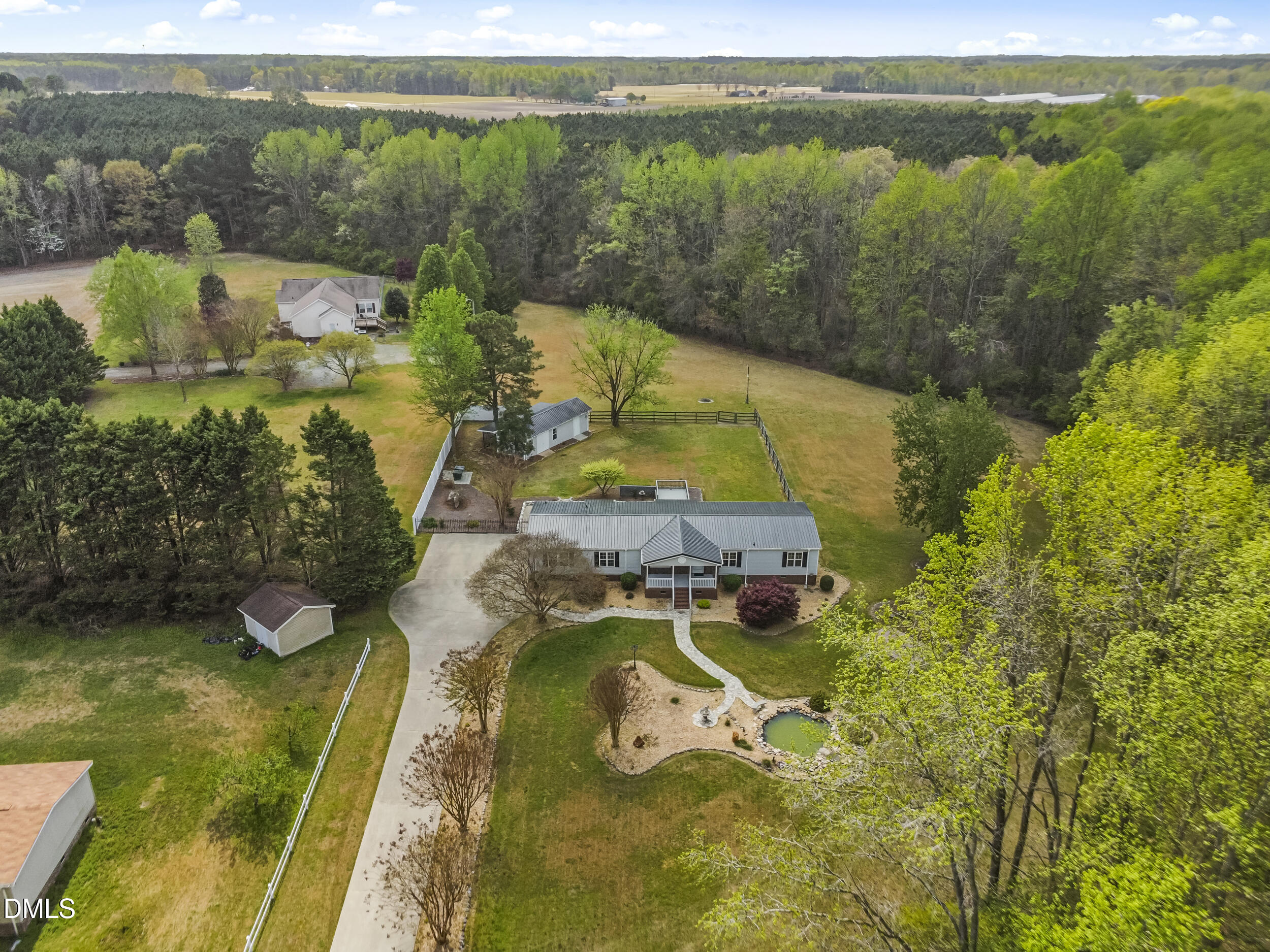 221 Pinkney Church Road Fremont, NC 27830 - Photo 1 of 36 a view of a swimming pool with a lake view