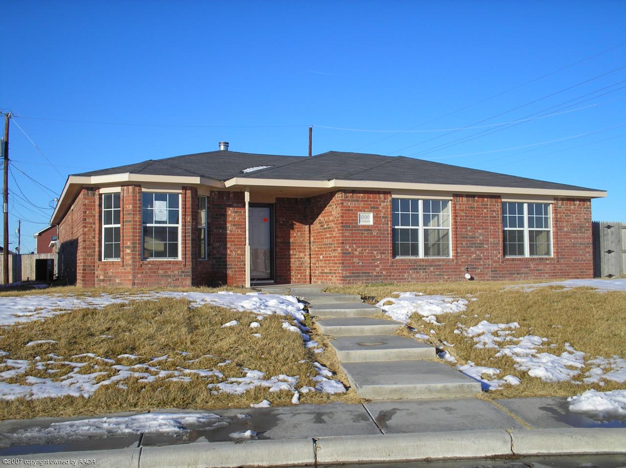 1000 Rushmore Drive Amarillo, TX 79110 - Photo 1 of 1 a front view of a house with garden