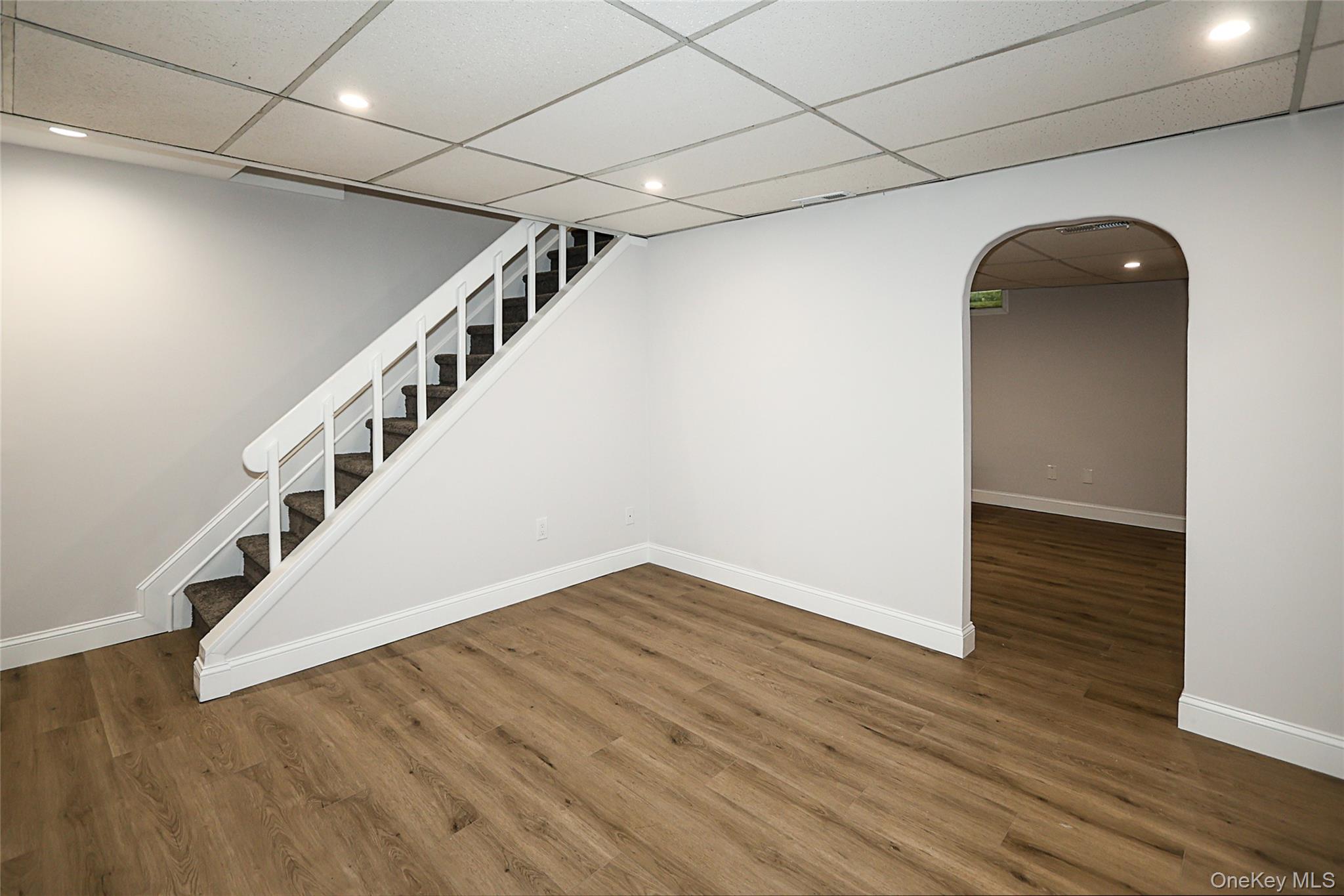10 Smith Yaphank, NY 11980 - Photo 21 of 26 a view of entryway with wooden floor