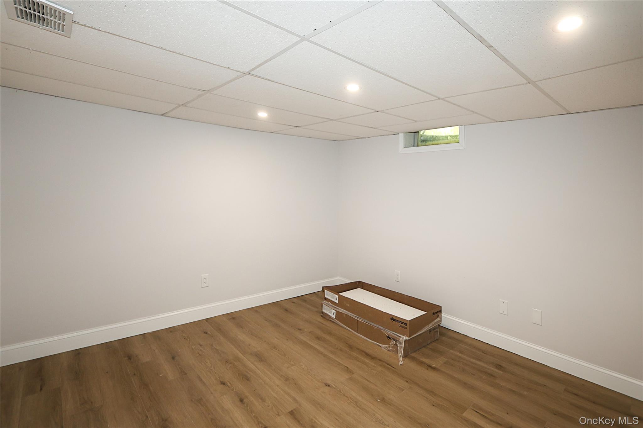 10 Smith Yaphank, NY 11980 - Photo 23 of 26 a view of room with wooden floor