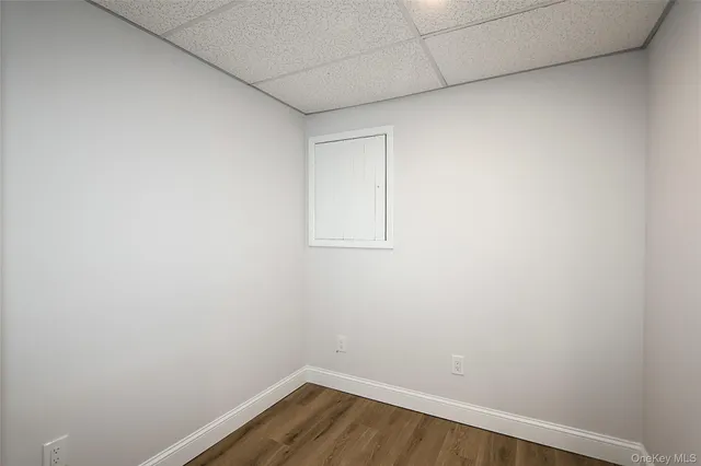 a view of small space with wooden floor