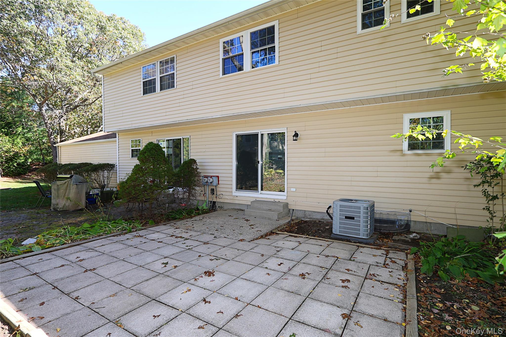 10 Smith Yaphank, NY 11980 - Photo 26 of 26 a view of a house with a backyard