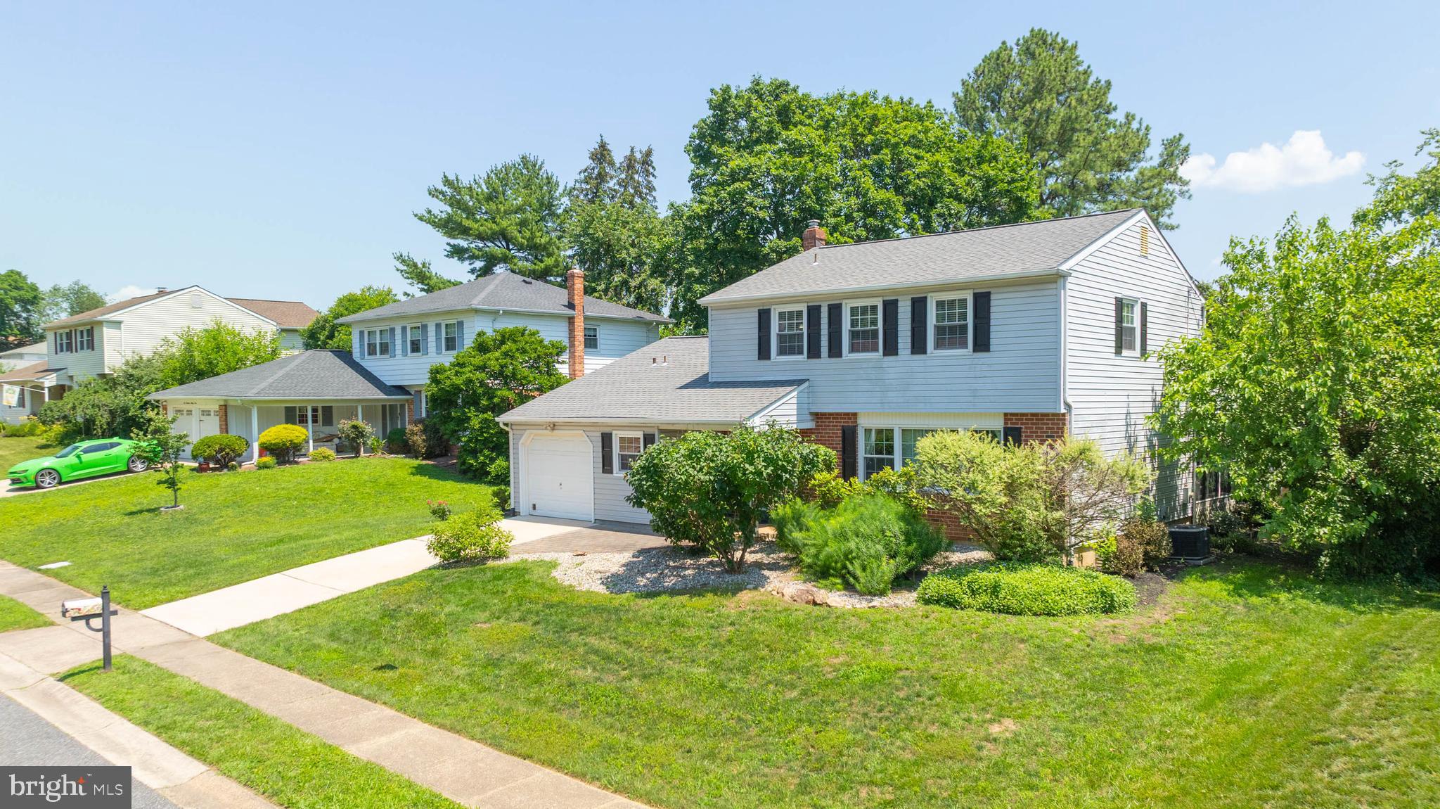 121 Decker Drive Newark, DE 19711 - Photo 41 of 57 a front view of a house with a yard