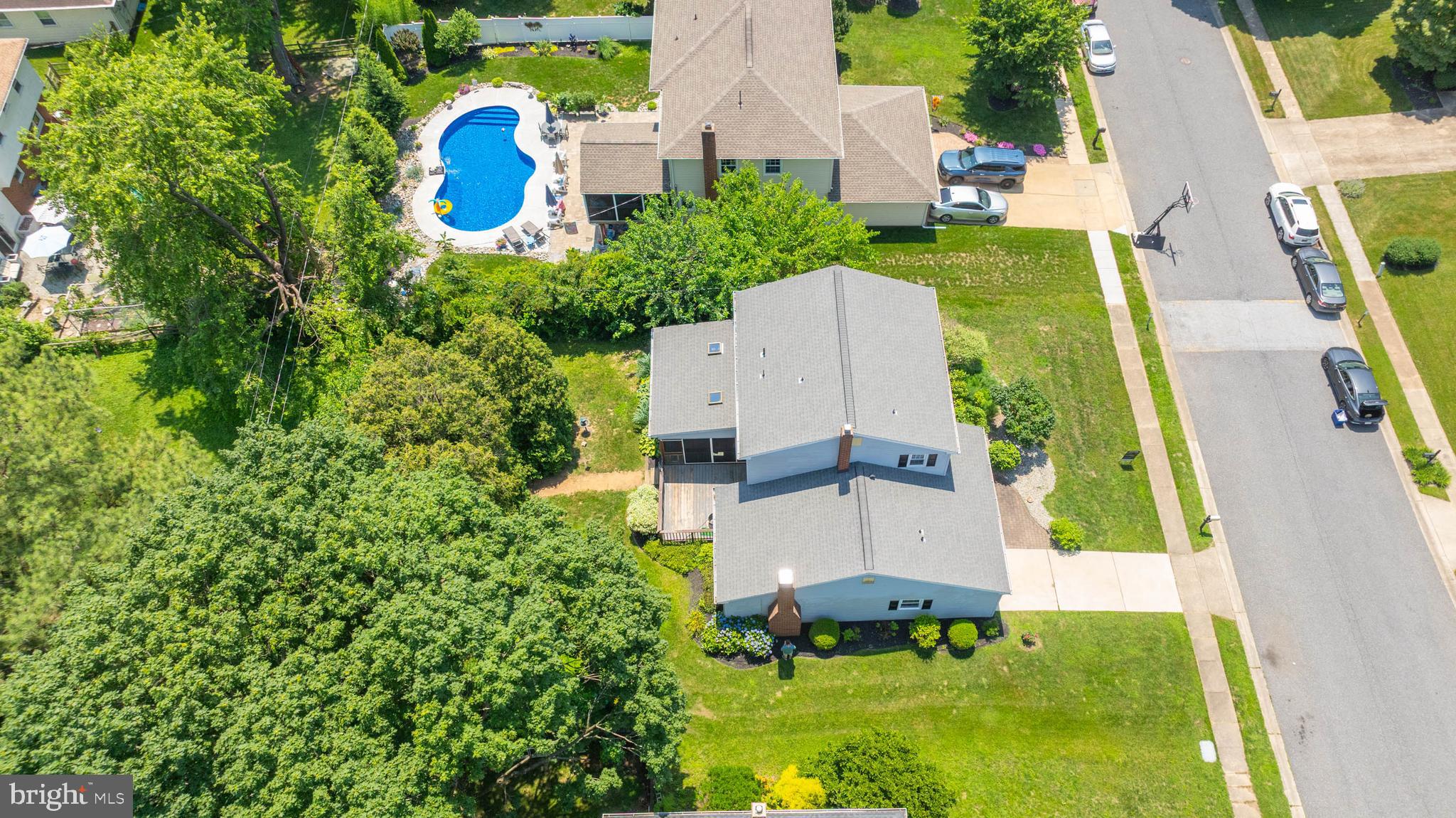 121 Decker Drive Newark, DE 19711 - Photo 49 of 57 an aerial view of a house with a garden and trees