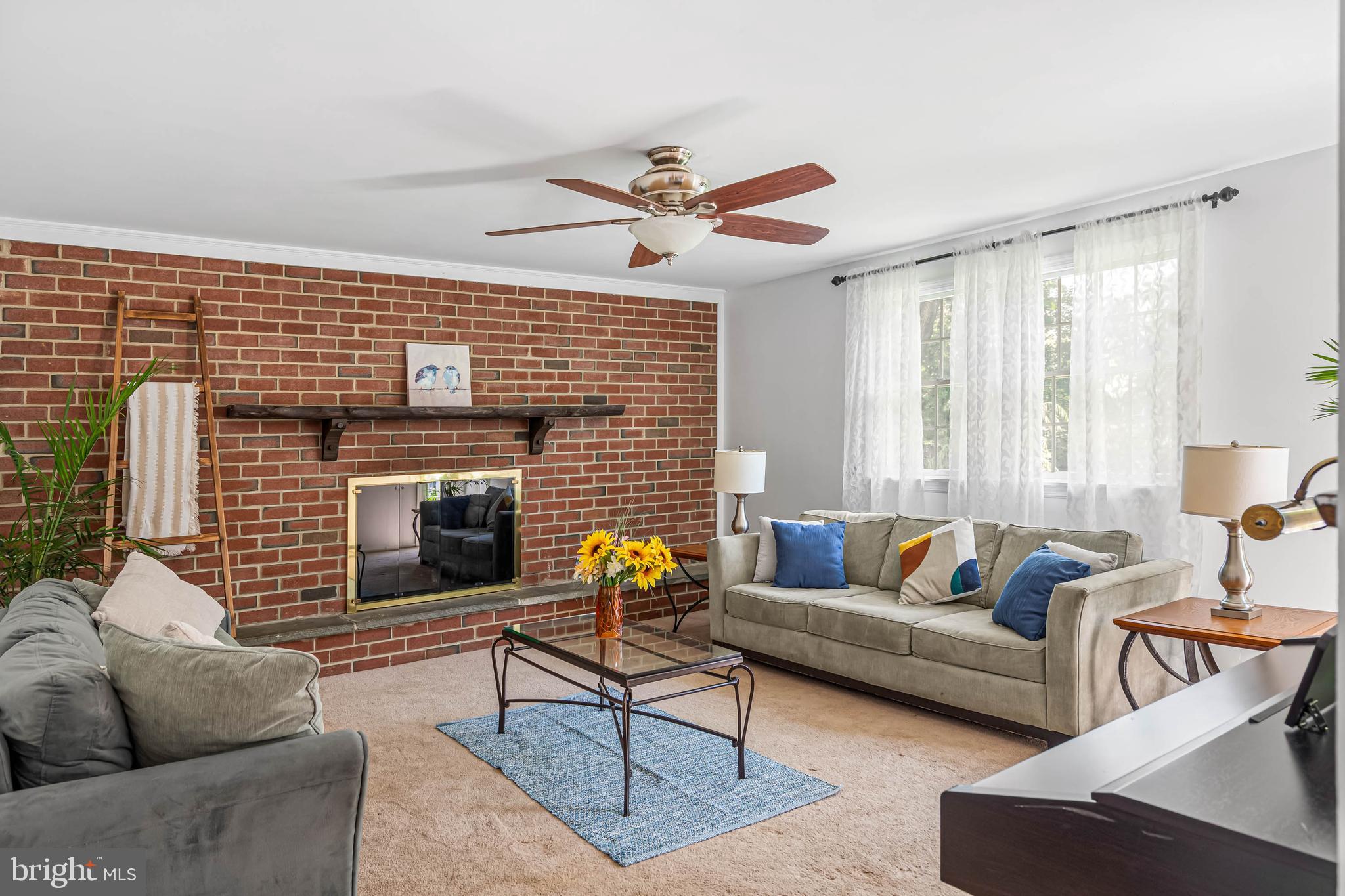 121 Decker Drive Newark, DE 19711 - Photo 5 of 57 a living room with furniture and a fireplace