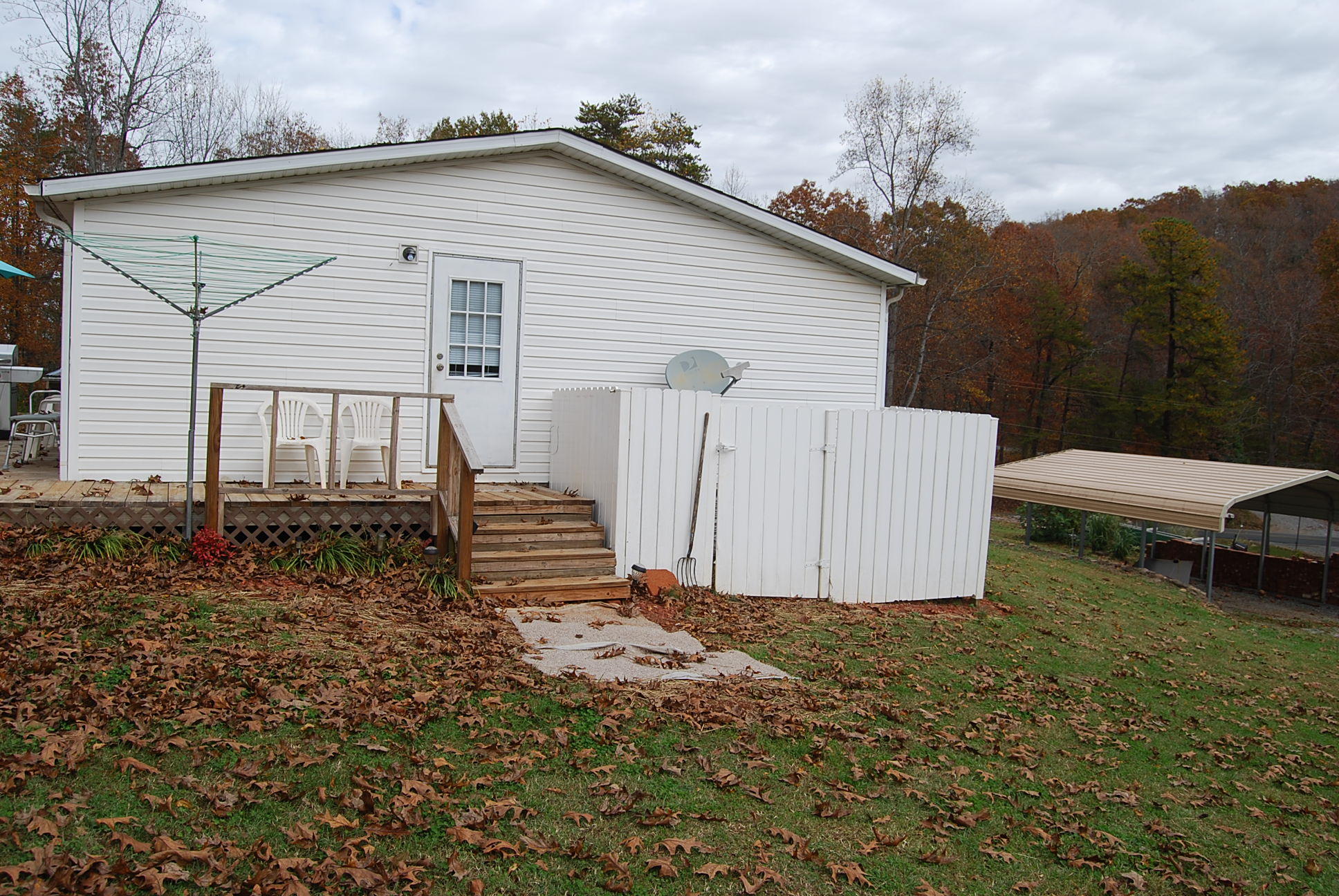 1019 Doe Mountain Road Goodview, VA 24095 - Photo 11 of 53 a view of a house with backyard