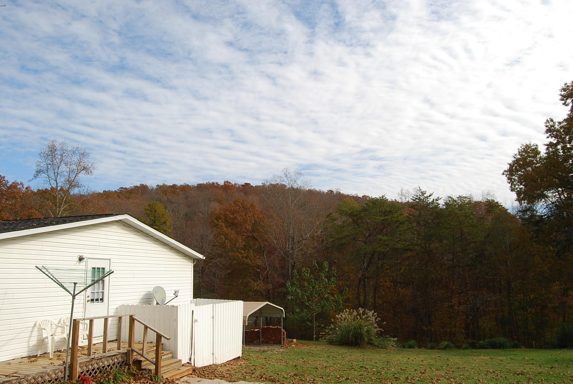 1019 Doe Mountain Road Goodview, VA 24095 - Photo 15 of 53 a view of a house with a yard