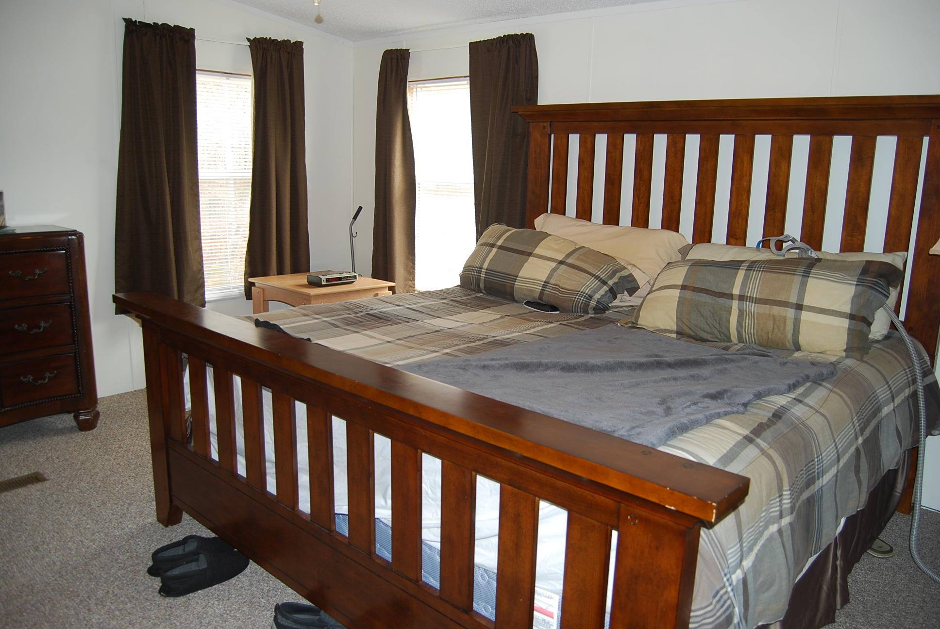 1019 Doe Mountain Road Goodview, VA 24095 - Photo 32 of 53 a bedroom with a bed and a window