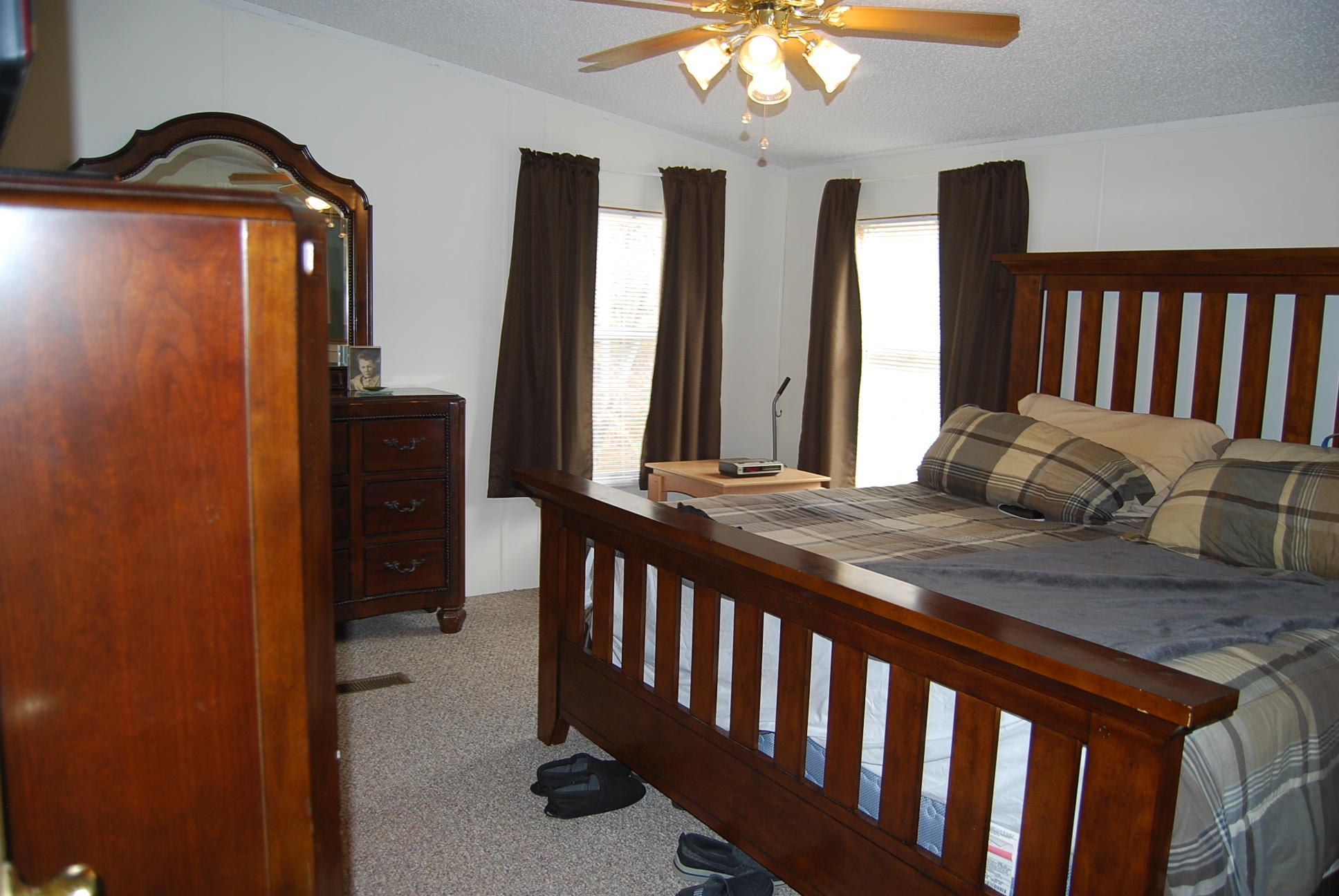 1019 Doe Mountain Road Goodview, VA 24095 - Photo 34 of 53 a bedroom with furniture and a large window
