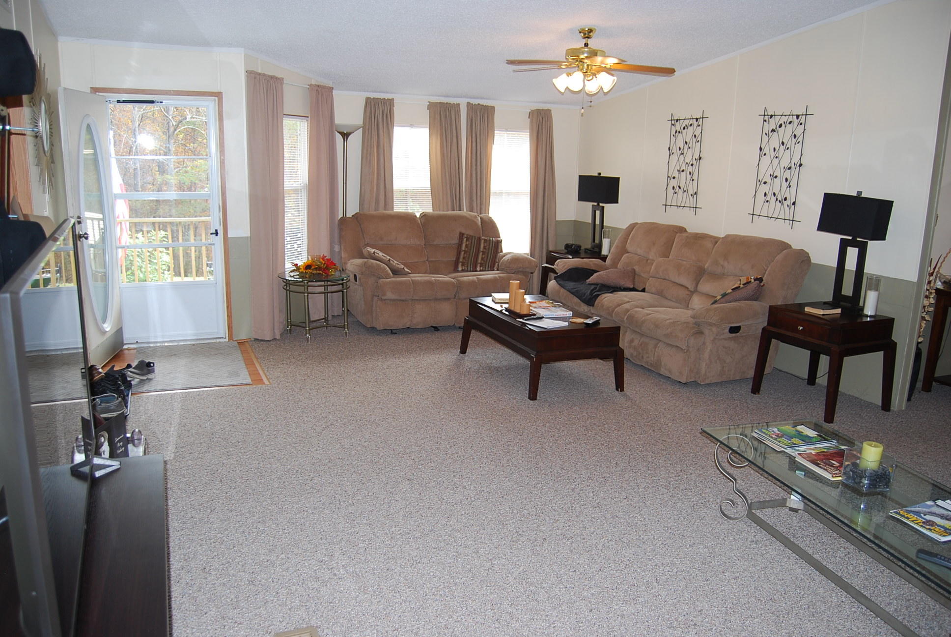 1019 Doe Mountain Road Goodview, VA 24095 - Photo 36 of 53 a living room with furniture and a window