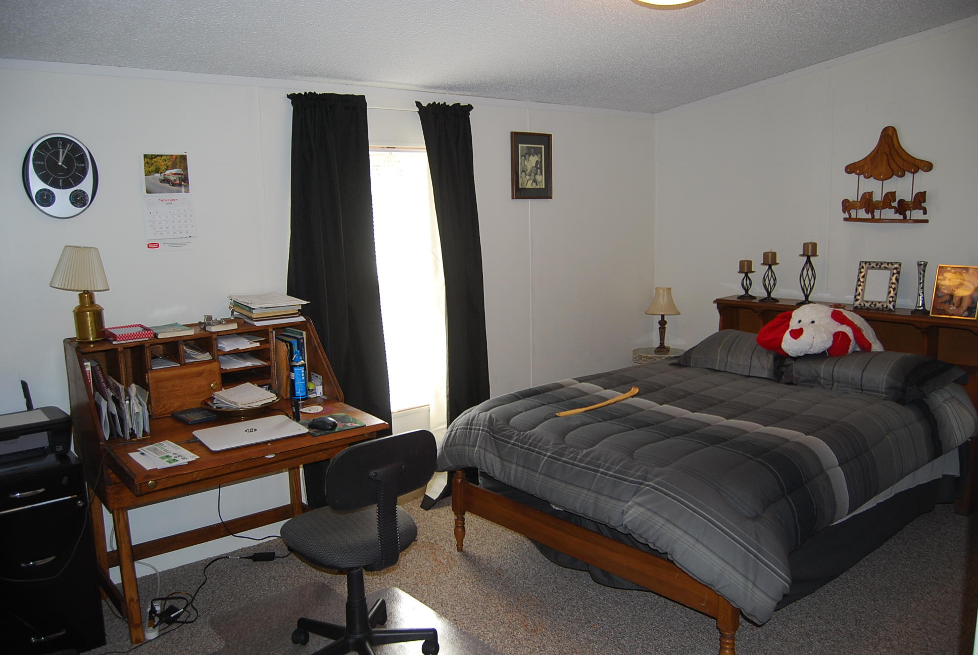 1019 Doe Mountain Road Goodview, VA 24095 - Photo 51 of 53 a bedroom with a bed and a window