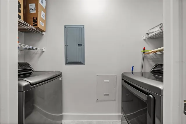 a kitchen with a stove and a refrigerator