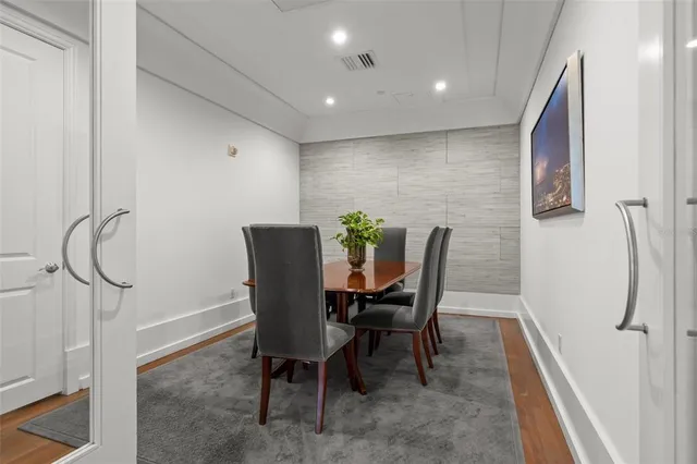 a kitchen with stainless steel appliances a sink and cabinets