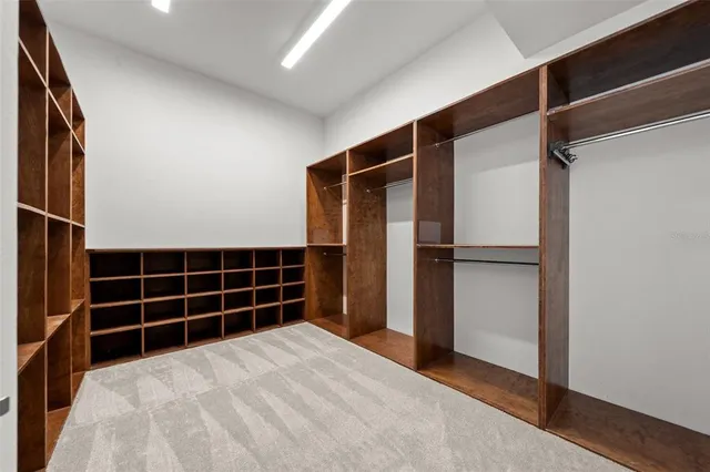 a view of empty room with windows