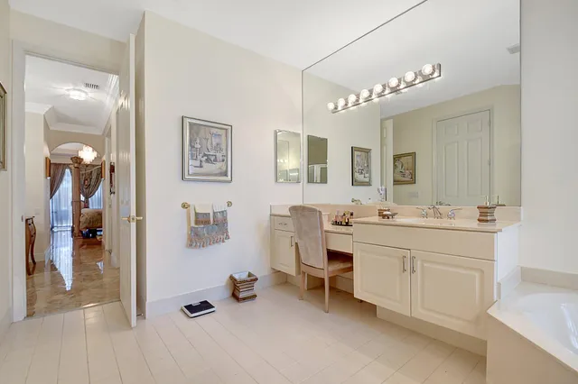 a spacious bathroom with a double vanity sink