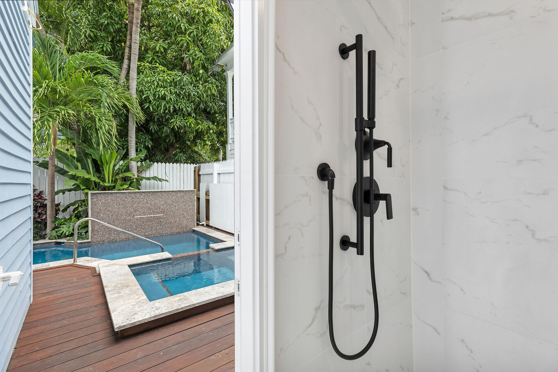 1015 Eaton Street Key West, FL 33040 - Photo 14 of 36 a view of a room with wooden floor and entryway