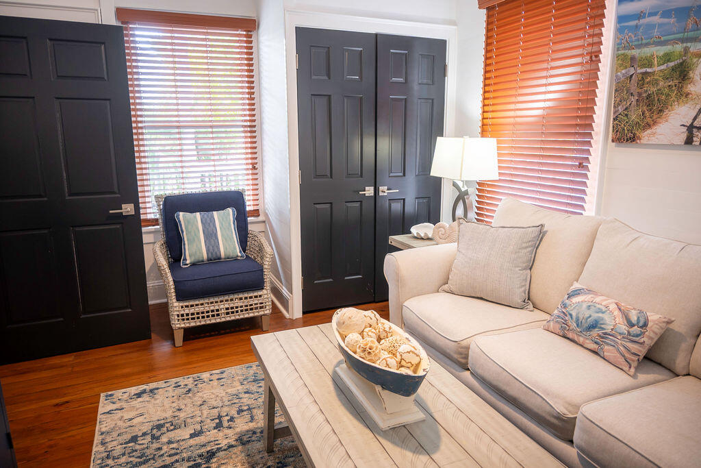 1015 Eaton Street Key West, FL 33040 - Photo 17 of 36 a living room with furniture and a rug