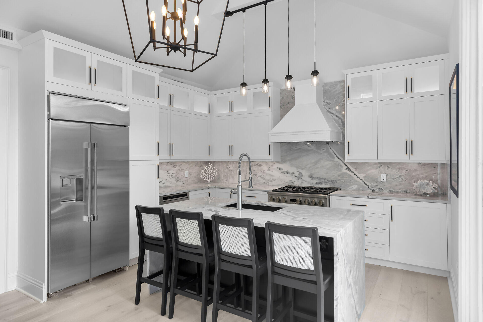 1015 Eaton Street Key West, FL 33040 - Photo 22 of 36 a kitchen with stainless steel appliances granite countertop a dining table chairs sink and cabinets