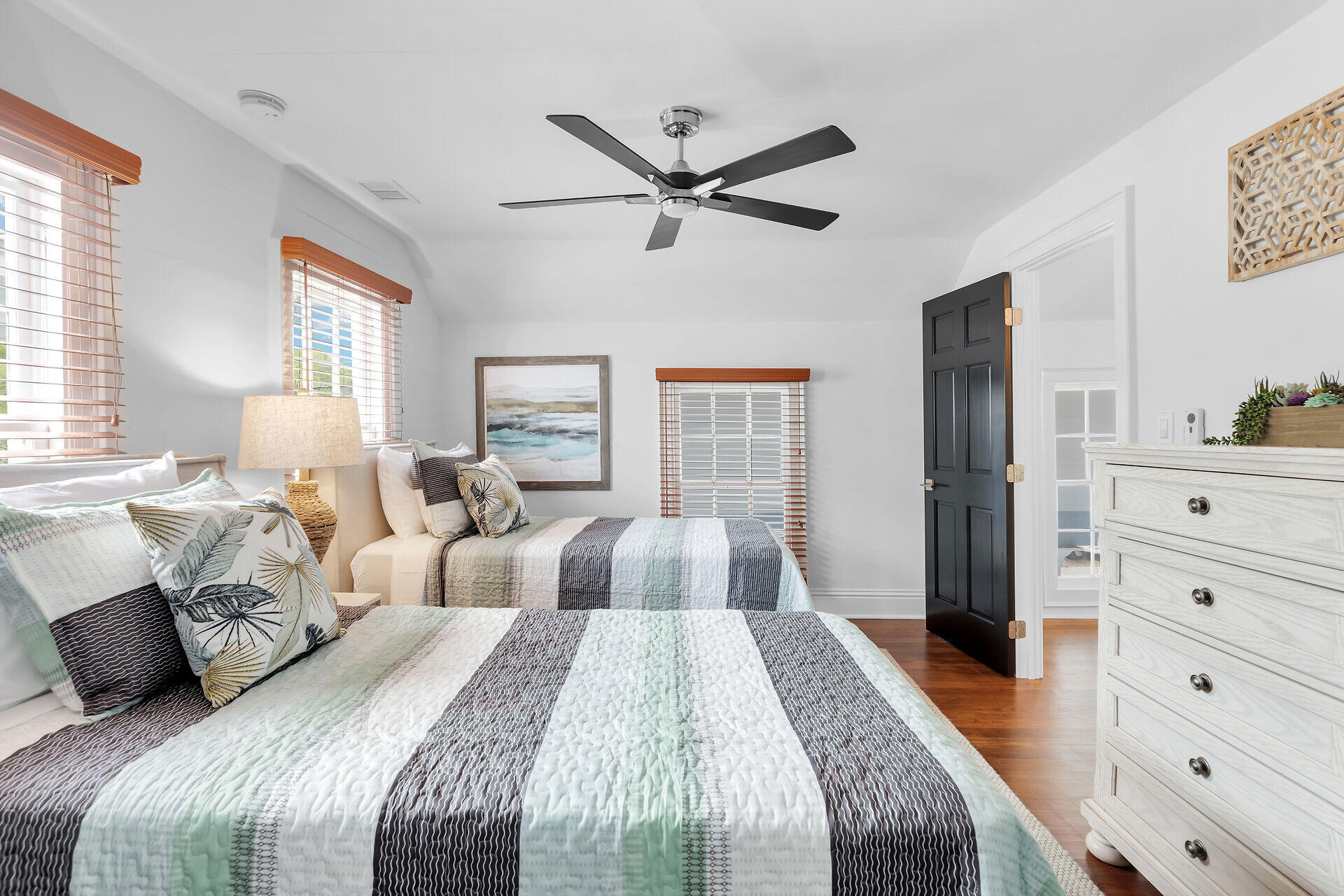 1015 Eaton Street Key West, FL 33040 - Photo 31 of 36 a bedroom with a large bed and a window