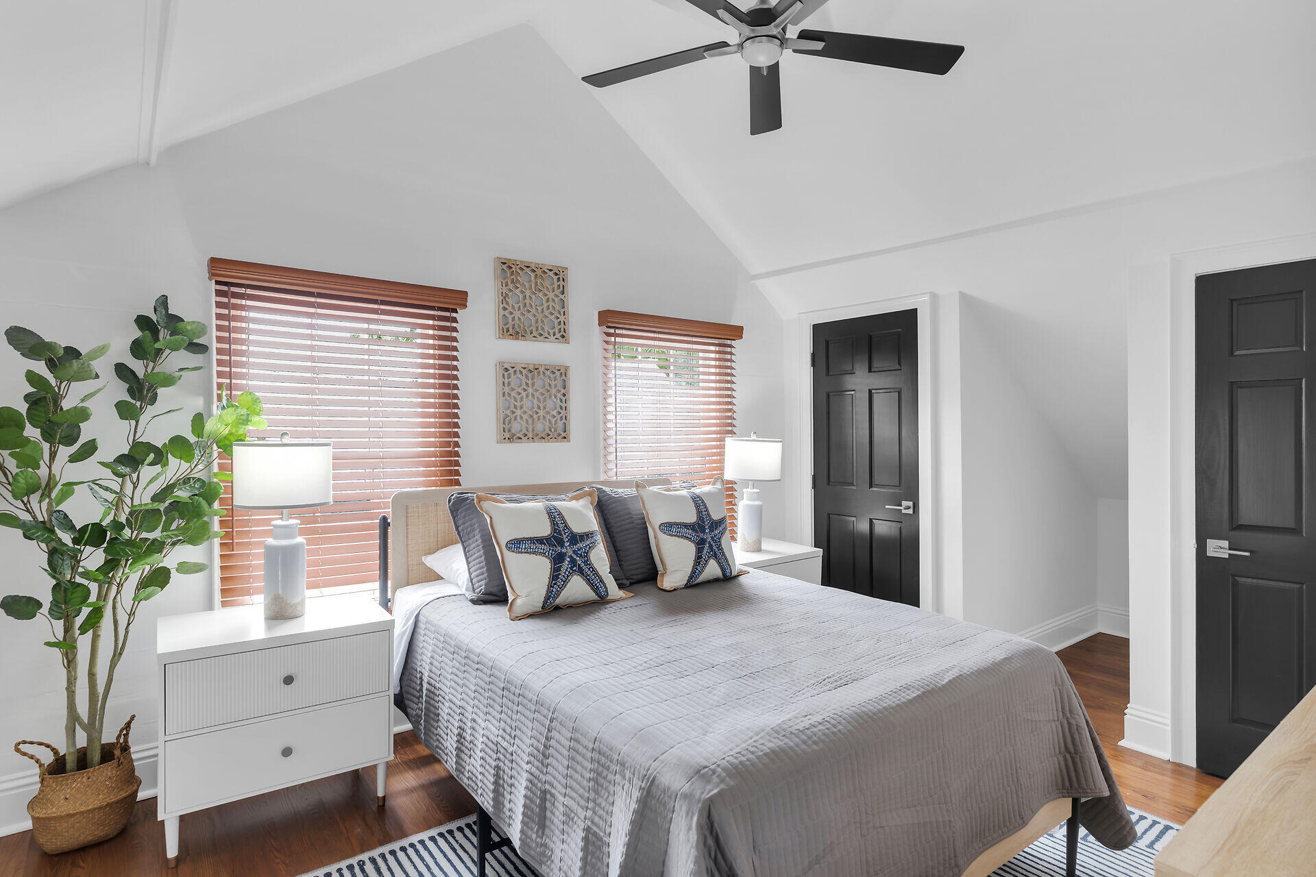 1015 Eaton Street Key West, FL 33040 - Photo 33 of 36 a bedroom with a bed and a potted plant