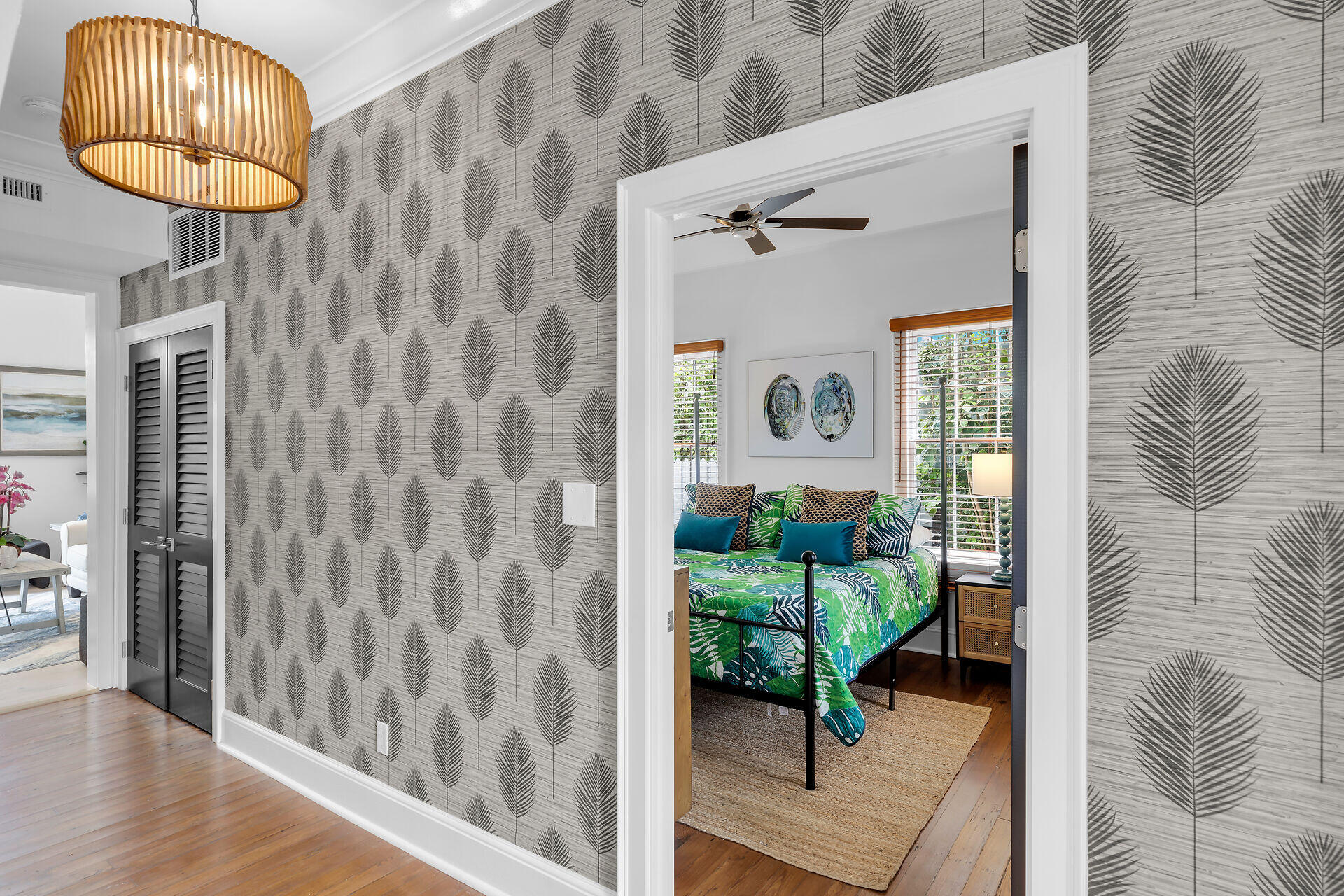 1015 Eaton Street Key West, FL 33040 - Photo 7 of 36 a living room with furniture and a chandelier