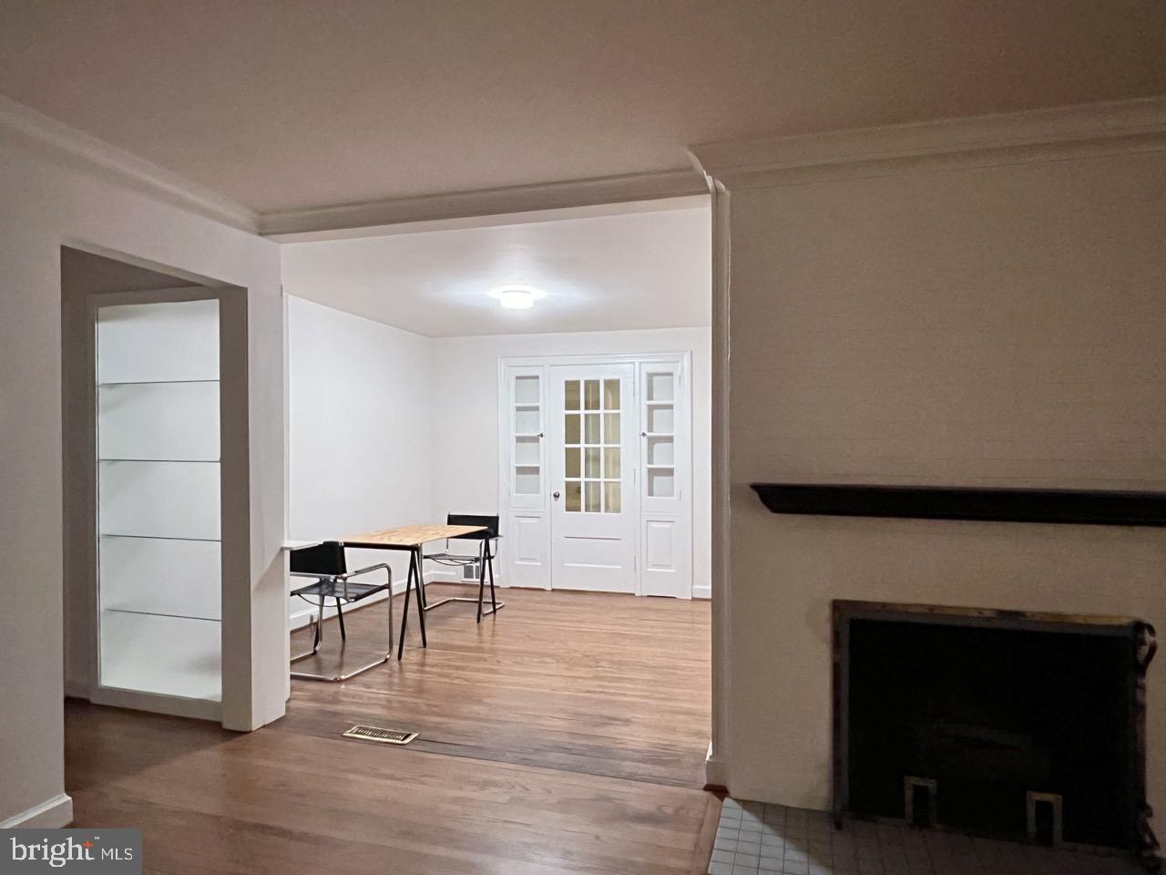 5507 Chesterbrook Road Bethesda, MD 20816 - Photo 11 of 24 a view of a livingroom with furniture and a fireplace